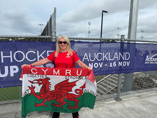 Stephanie Bradley holding a Welsh flag