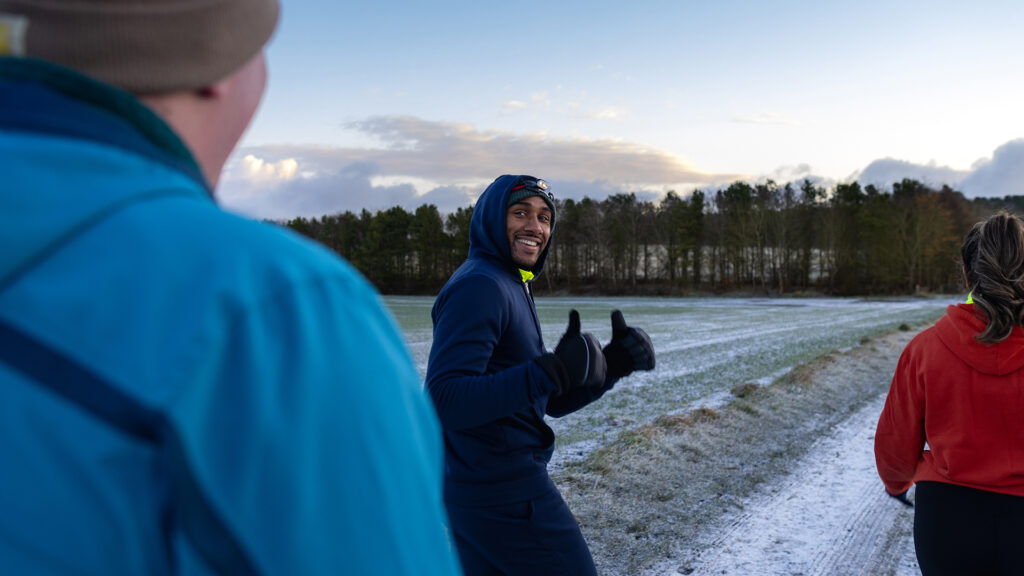Small group of people walking along a country track