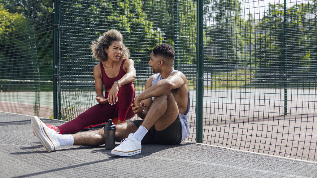 Friends Discussing Their Basketball Training Session