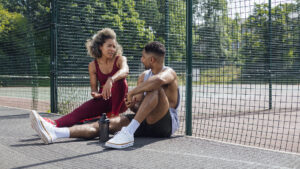 Friends Discussing Their Basketball Training Session
