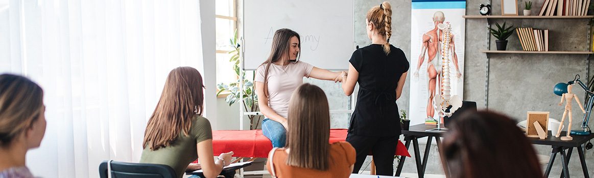 iStock-1203233985_Women receiving training around anatomy physiotherapy_1227x350