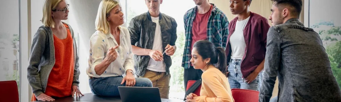 Group of university students with lecturer